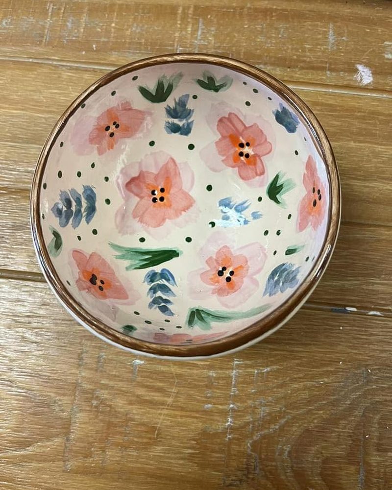Bowl painted with pink flowers
